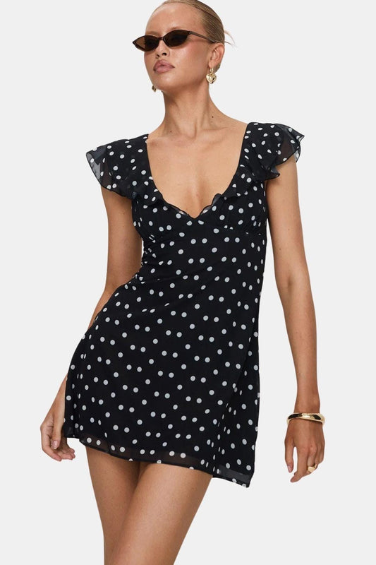 Damenkleid mit Punktmuster und Flügelärmeln