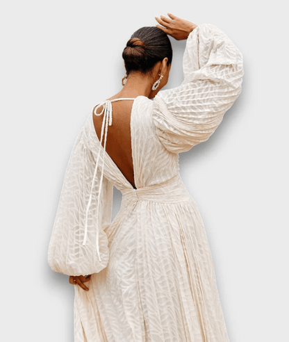 Langes Kleid mit Ballonärmeln in Cremeton