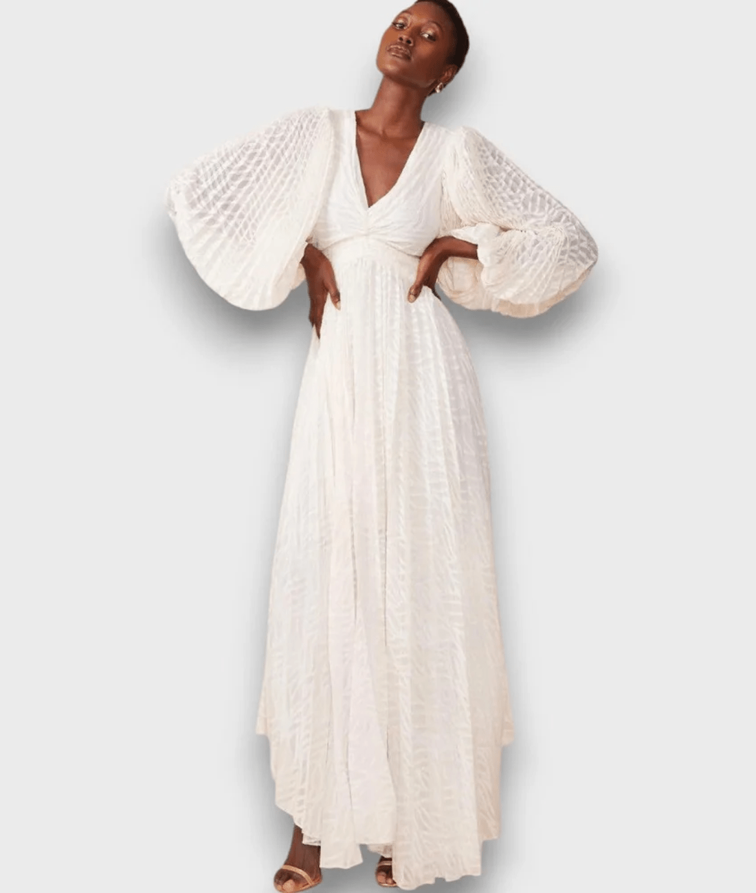 Langes Kleid mit Ballonärmeln in Cremeton