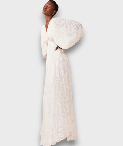 Langes Kleid mit Ballonärmeln in Cremeton